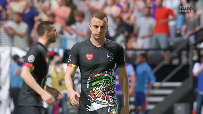 Drużyna w koszulkach WOŚP w grze fifa