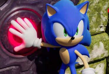 Sonic trzymający duży czerwony przycisk w grze Sonic Frontiers