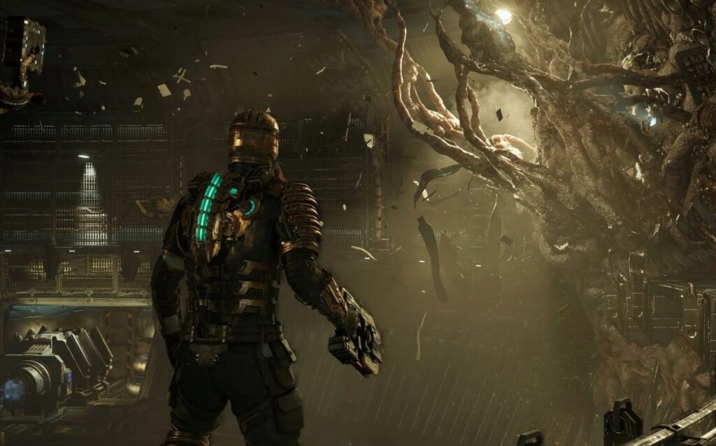 Główny bohater Dead Space Remake w mrocznym pomieszczeniu obok macek