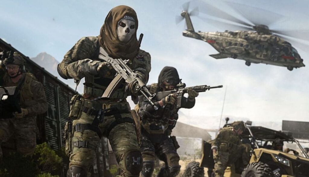 Kilku żołnierzy z bronią obok pojazdu terenowego i helikoptera wojskowego w Call of Duty: Modern Warfare 2