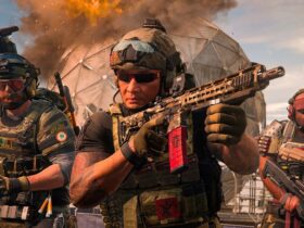 Trzech żołnierzy w Call of Duty: Modern Warfare 2 stojących przed wybuchającym budynkiem