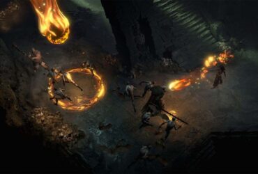 Gracz Diablo 4 walczący z przeciwnikami w podziemnej krypcie za pomocą magii ognia