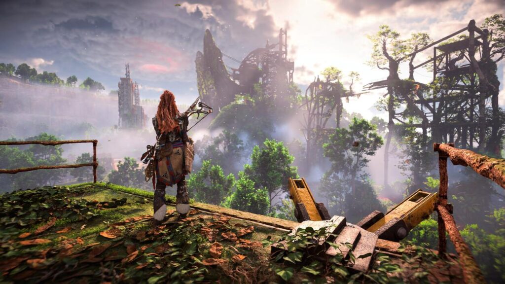 Alloy stojąca na wzgórzu przed pięknym krajobrazem w Horizon Forbidden West