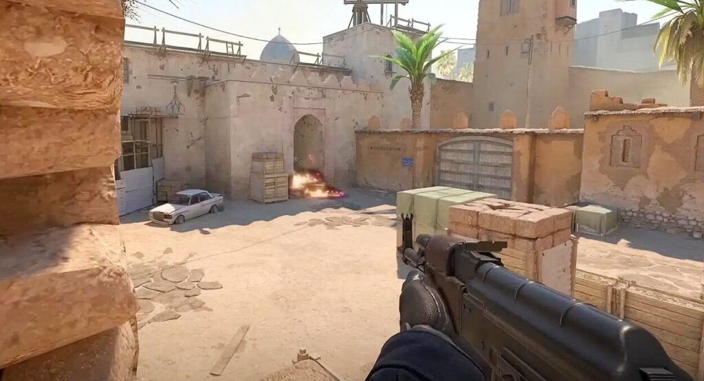 Gracz celujący z AK-47 w tunel w Counter-Strike 2