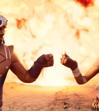 Dwie postacie z Fortnite przybijające żółwika przed wybuchem, który dzieje się w tle
