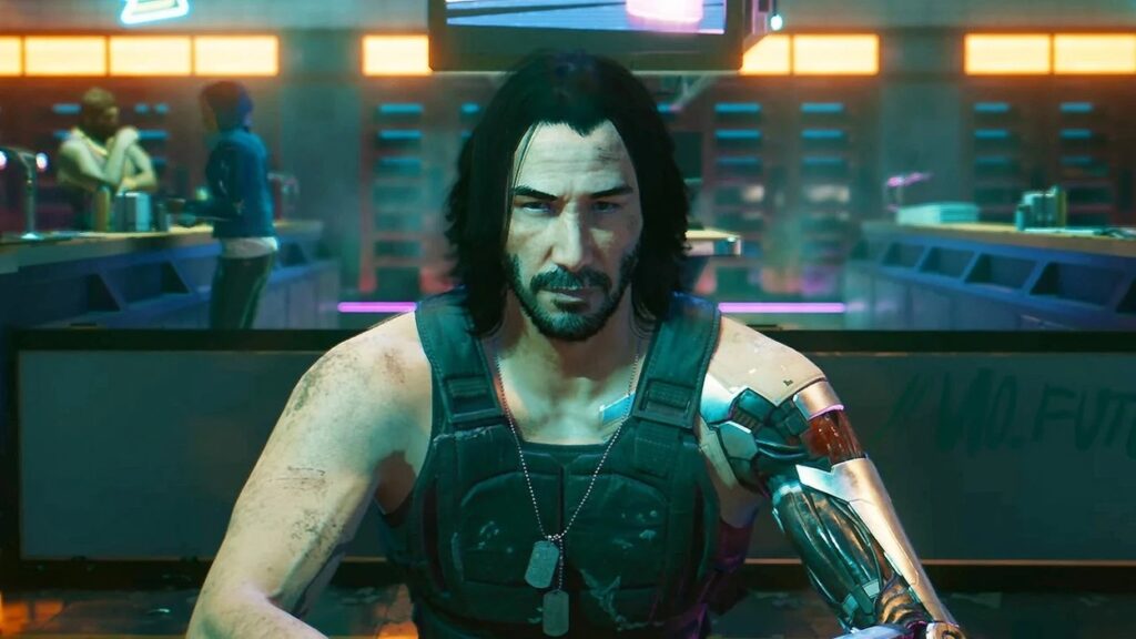 Johny Silverhand siedzący przed graczem w Cyberpunk 2077