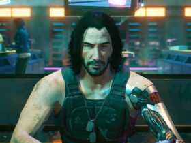 Johny Silverhand siedzący przed graczem w Cyberpunk 2077