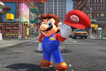 Mario z czapką na palcu w mieście w Super Mario Odyssey