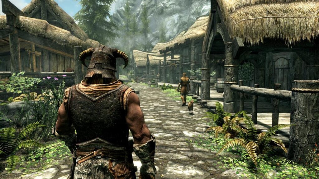 Główny bohater The Elder Scrolls 5: Skyrim przemierzający wioskę