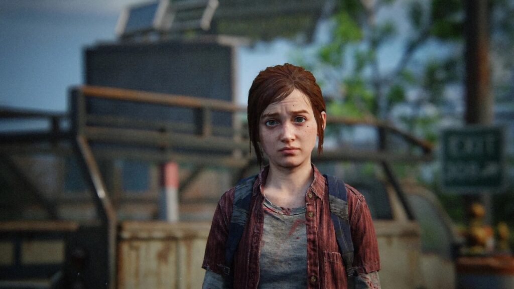 Smutna Ellie na tle miasta w The Last of Us: Part 1