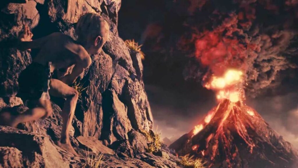 Gollum idący po skale i patrzący na wybuchający wulkan w grze The Lord of the Rings: Gollum