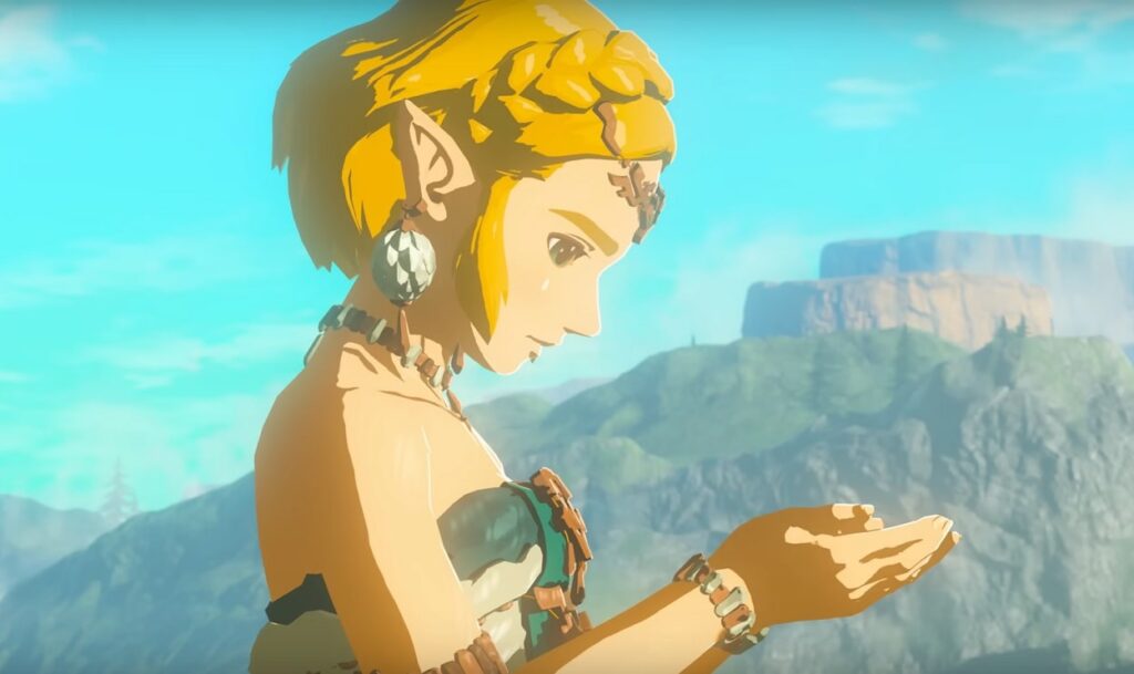 Zelda ze zwiastuna trzymająca coś w rękach.