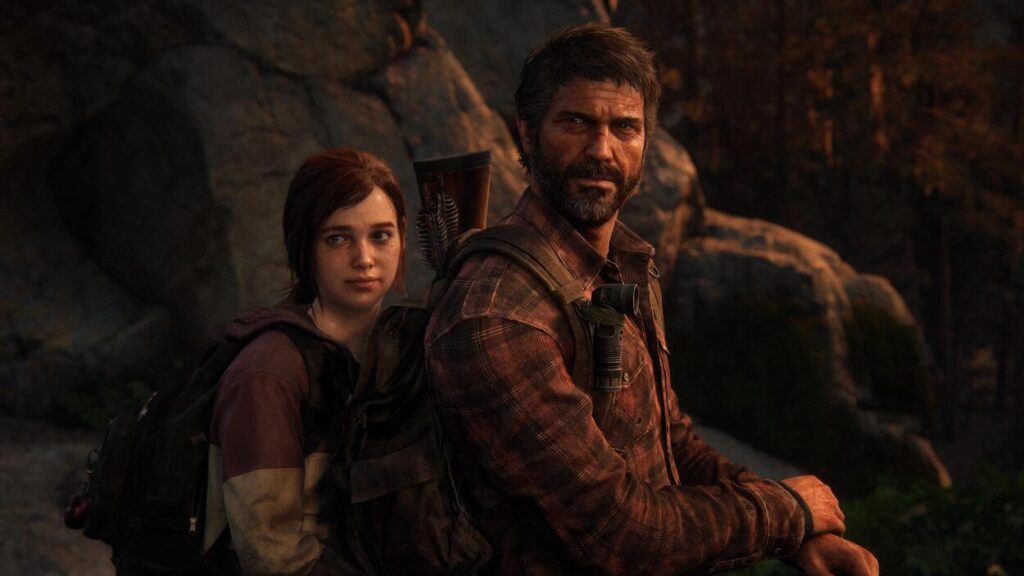 Joel stojący przed Ellie w jaskini w The Last of Us Part 1