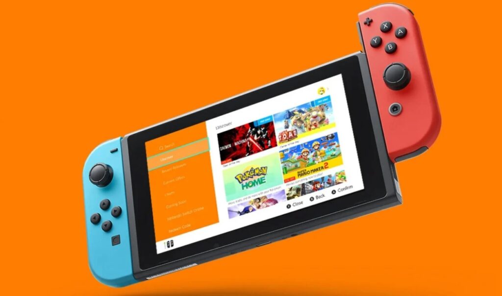 Nintendo Switch na pomarańczowym tle