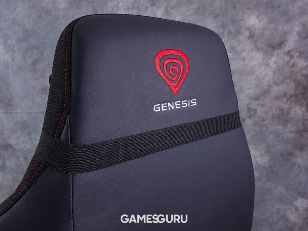 Logo marki Genesis na oparciu