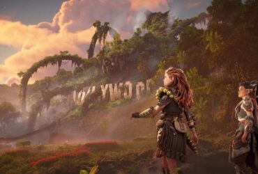 Aloy z inną bohaterką niedaleko napisu Hollywood w Horizon Forbidden West