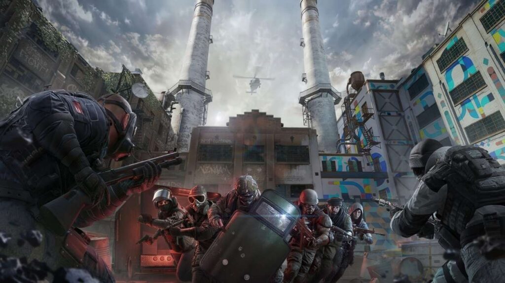Kilku operatorów z Rainbow Six Siege X podczas walki wśród miejskich budynków