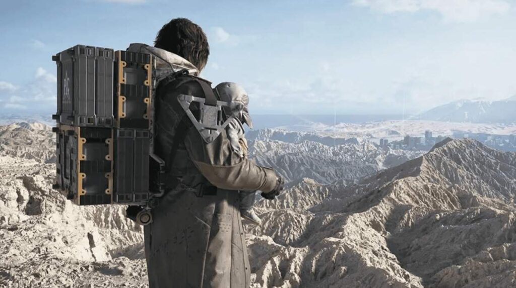 Główny bohater Death Stranding 2 stoi przed górskim krajobrazem i miastem w tle